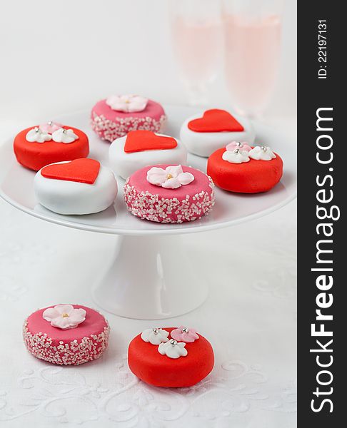 Sweet Valentine Petit Fours on a cake stand. Sweet Valentine Petit Fours on a cake stand