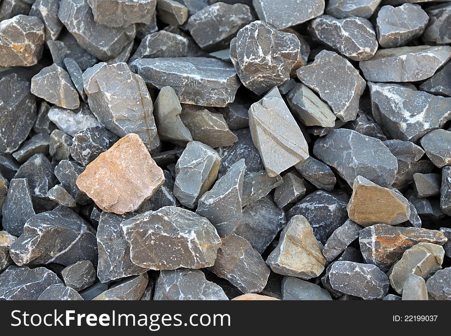 Closeup of piles of gray stone