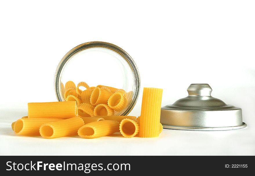 Maccheroni and its pot on a white background. Maccheroni and its pot on a white background