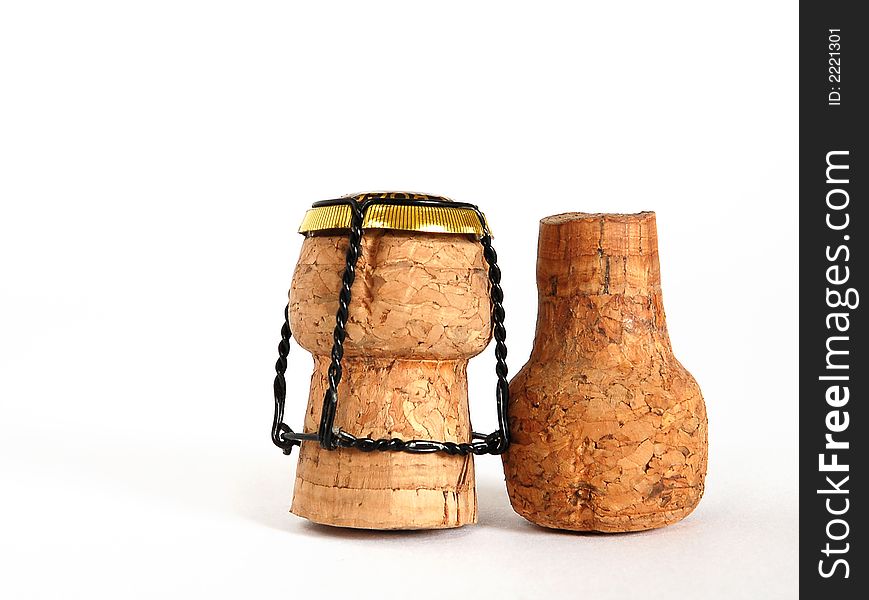 Close up of two champagne corks isolated on a white background