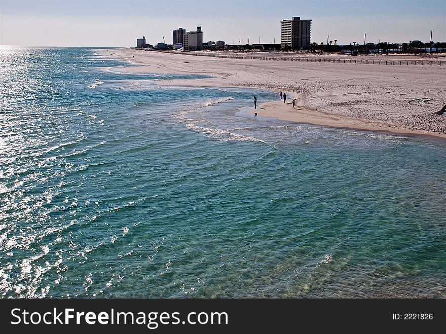 Sparkling green and white sand of the Emerald Coast in Florida. Sparkling green and white sand of the Emerald Coast in Florida