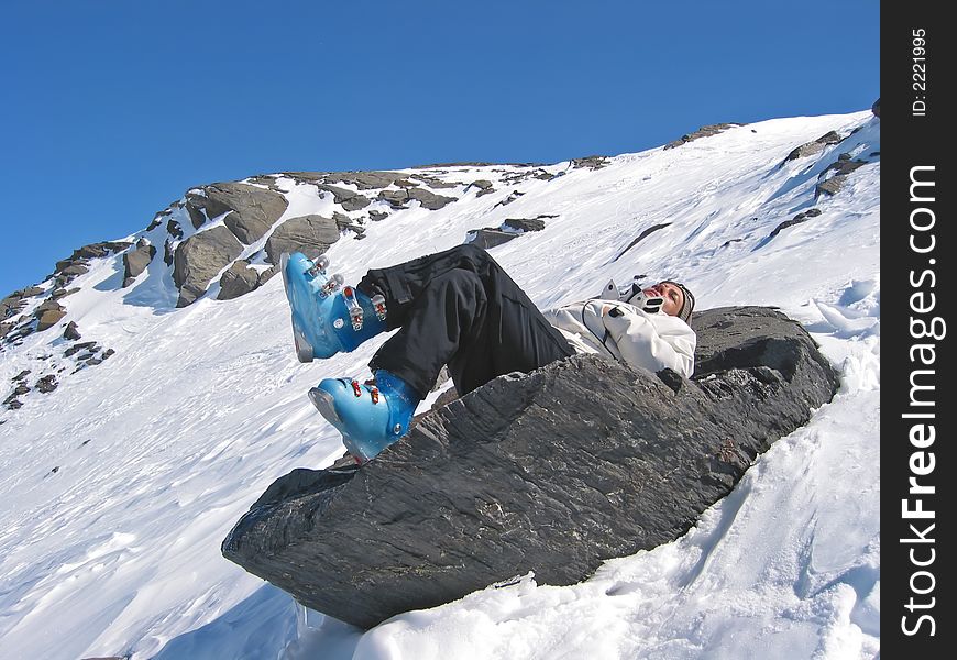 Woman On A Rock With Skiwears
