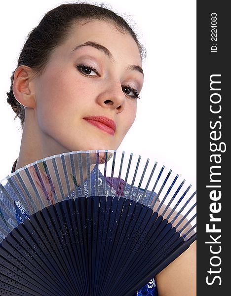 White girl with fan on the white background