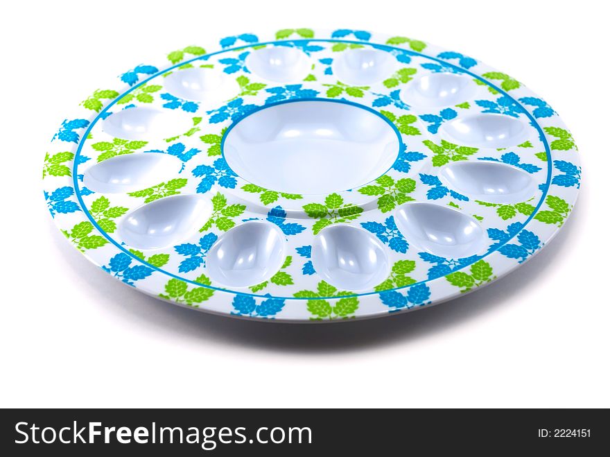 Beautiful plate for eggs on a white background