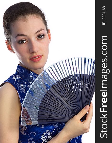White girl with fan on the white background. White girl with fan on the white background