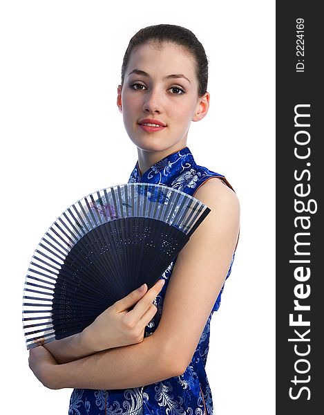 White girl with fan on the white background. White girl with fan on the white background