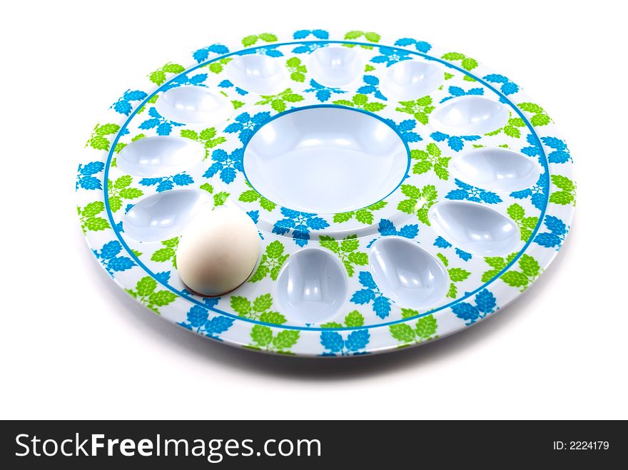 Beautiful plate for eggs on a white background
