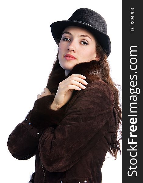 White girl with jacket and hat on the white background. White girl with jacket and hat on the white background