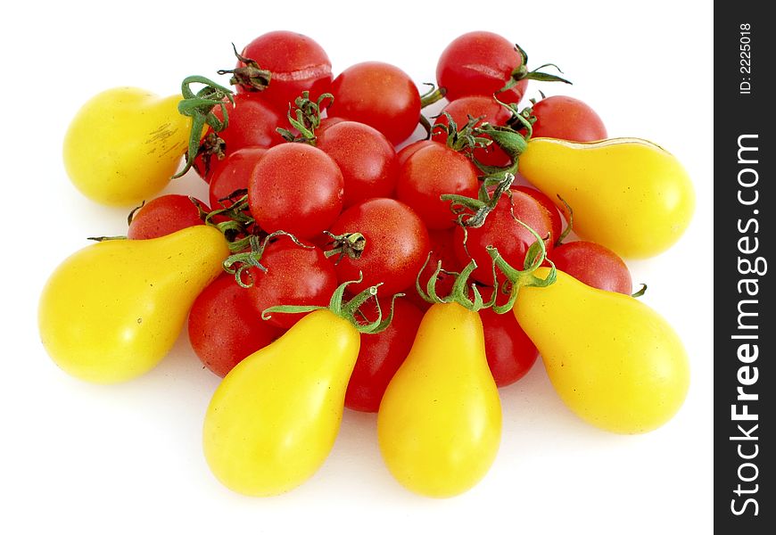 Red and yellow cherry tomatoes - isolated on white background. Red and yellow cherry tomatoes - isolated on white background