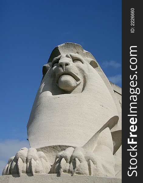 A lion sculpture against a blue sky in Nieuwpoort (Belgian). A lion sculpture against a blue sky in Nieuwpoort (Belgian).