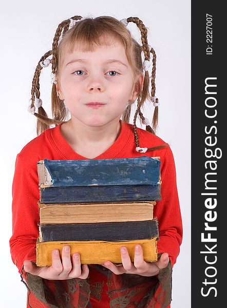 The girl with old books on a white background. The girl with old books on a white background