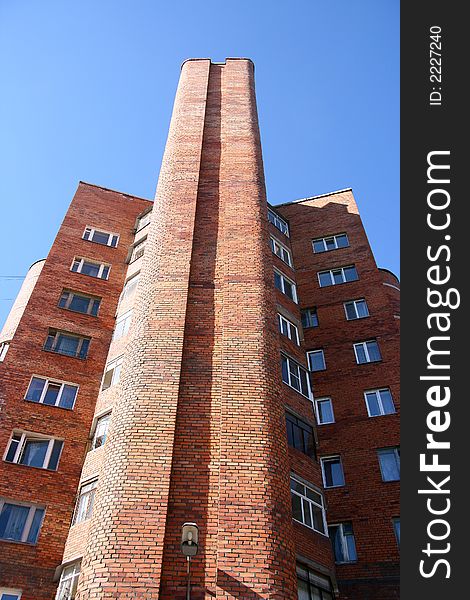 Multi-storey city a residential building from a brick. Multi-storey city a residential building from a brick.