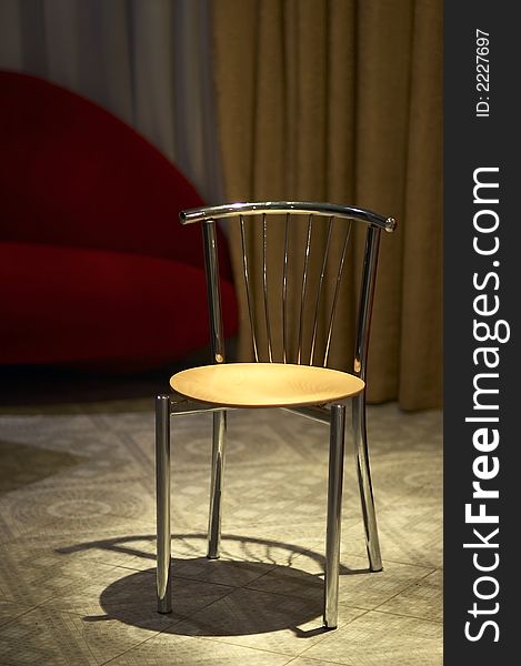 A nice chair in an evening room. A nice chair in an evening room