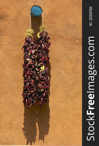 Red Chiles hang on a building in Santa Fe, New Mexico