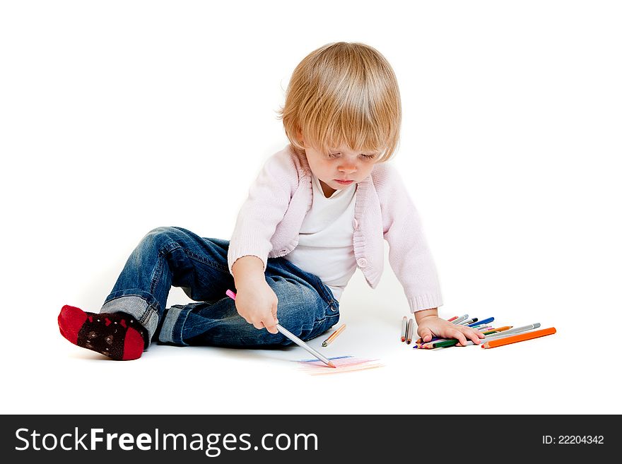 Cute little girl painting on the floor. on white. Cute little girl painting on the floor. on white