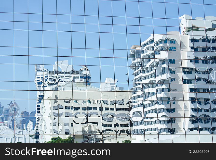 Reflection in a mirror image of the building.