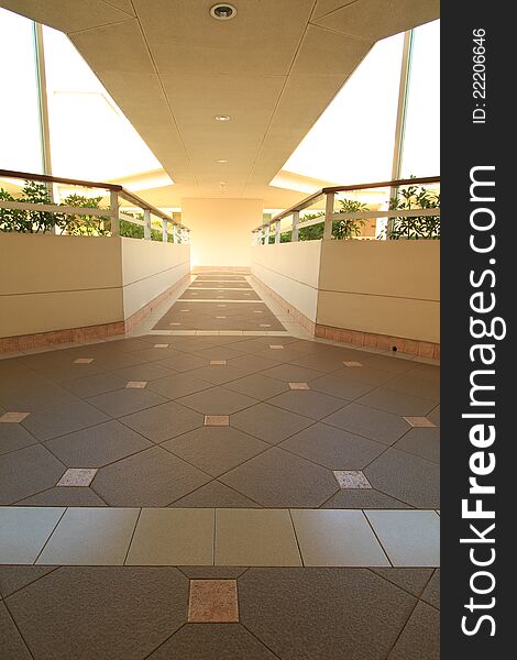 Long corridor between building decorated with beautiful tiles