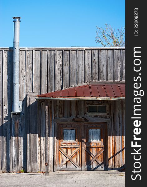 Old wooden store building in the morning sun