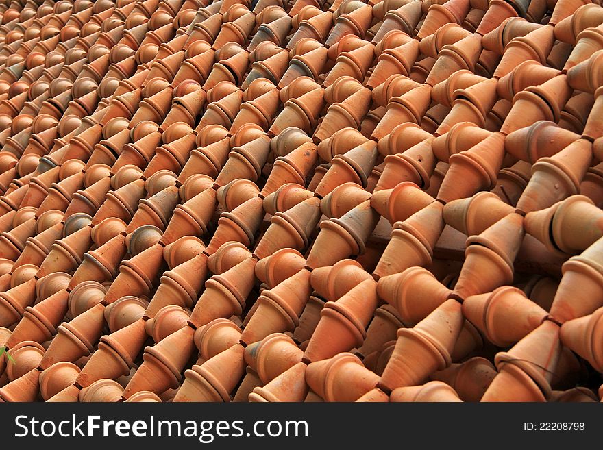Thousands of Baked Clay Pots lining up as a garden