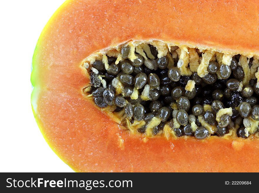 Closeup photo of Holland papaya (grown in Asia) on a white background. Closeup photo of Holland papaya (grown in Asia) on a white background