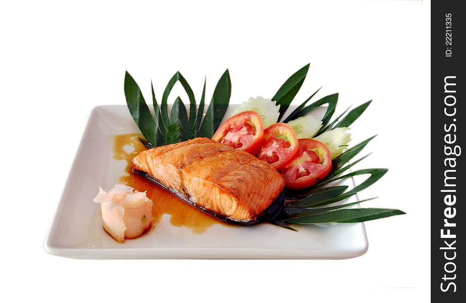 A delicious grilled salmon with vegetables. A delicious grilled salmon with vegetables