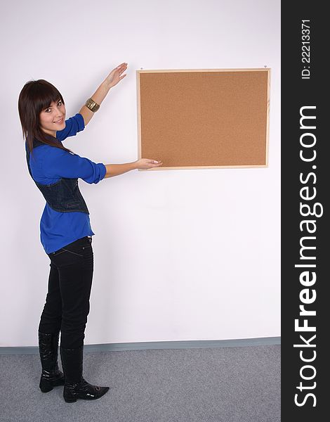 Happy Woman With Blank Pin Board.