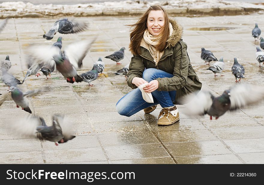 Happy girl with doves