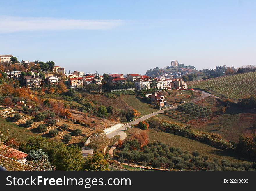 Town in the mountains with vineyards, and olive trees