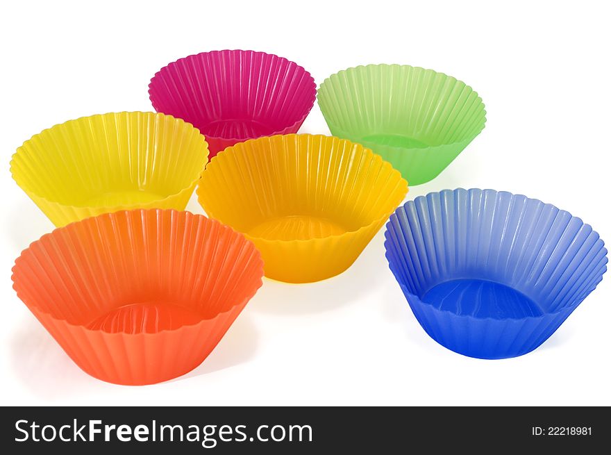 Empty tins for baking cakes on a white background