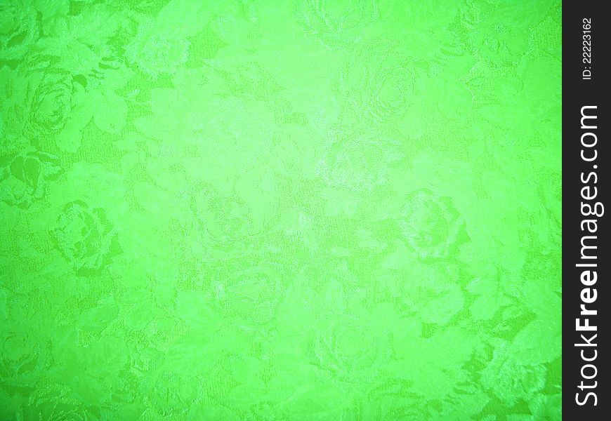 The light green pattern on the wallpaper background