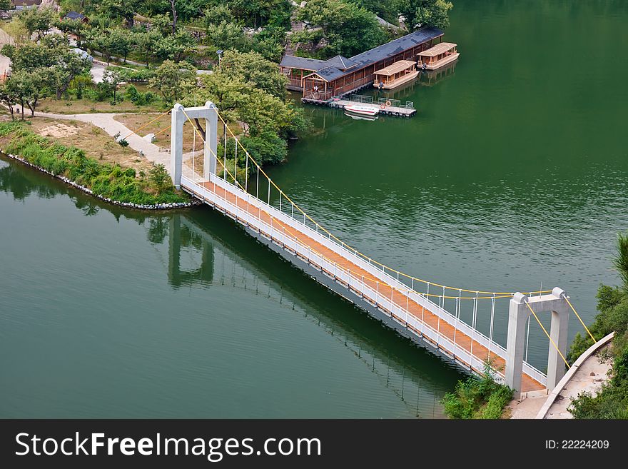 Bridge across a calm lake