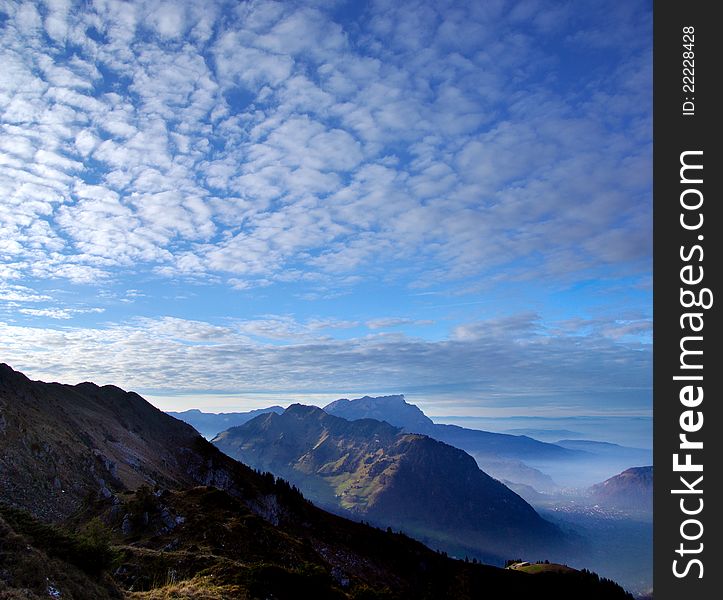 A view of the Stanserhorn mountain and misty Engelberg valley in the soft afteroon light. Photograph taken from Haldigrat, Nidwalden, Switerland. A view of the Stanserhorn mountain and misty Engelberg valley in the soft afteroon light. Photograph taken from Haldigrat, Nidwalden, Switerland.