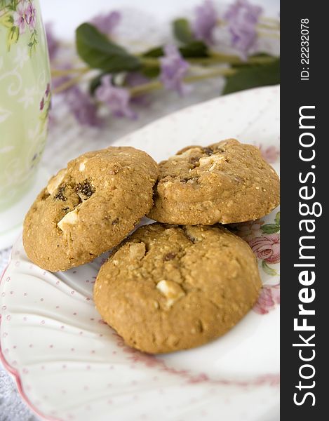 Close up three of cookies in tea set