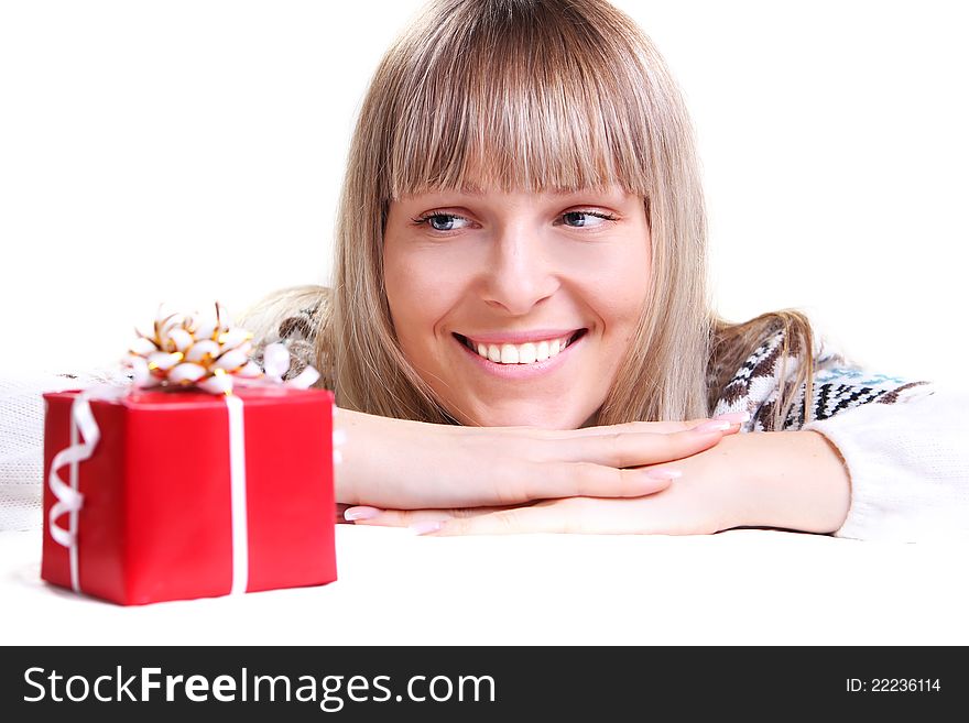 Young lady looking to box of gift. Young lady looking to box of gift