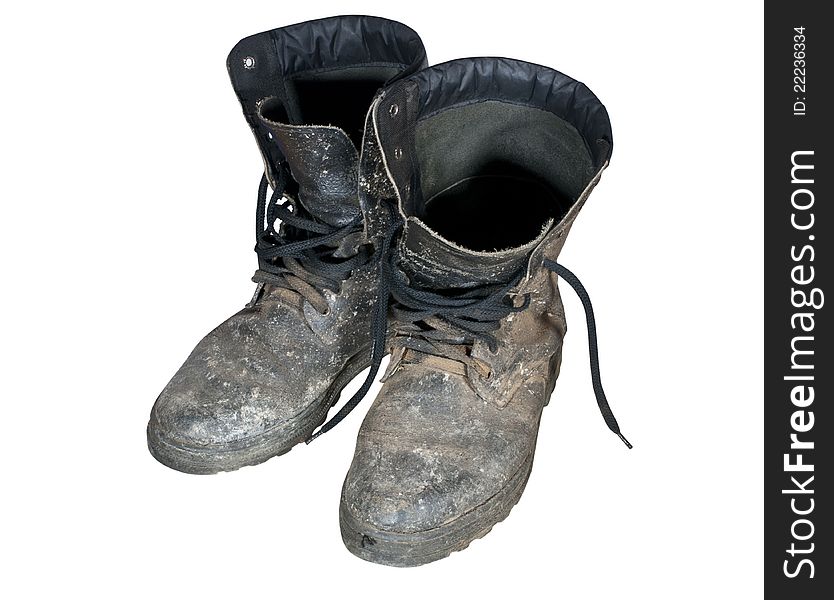 Old combat boots the isolated on white