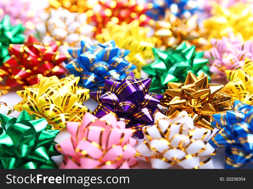 Colorful christmas background of bows. Colorful christmas background of bows