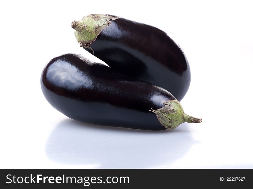 Two eggplants on the white background.