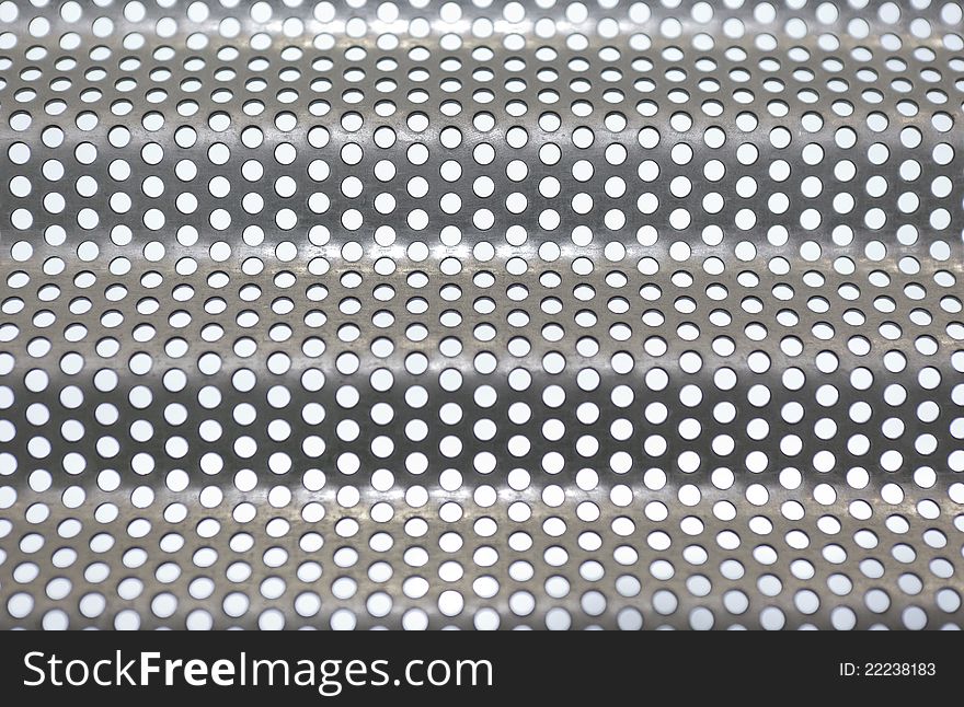 Abstract metallic wave pattern with holes. Abstract metallic wave pattern with holes