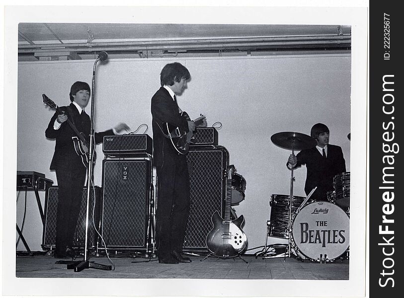 Creator: Nick Newbery

Date: 2nd November 1964. 

Original format: Photographic print.

Description: A photograph showing George, Paul &amp; Ringo playing a show at the King&#x27;s Hall, Belfast, in November 1964.

PRONI ref: D4542/2/1/4A

Picture Credit: Nick Newberry

Copying and copyright:
Please see http://www.proni.gov.uk/index/research_and_records_held/copying_and_copyright.htm

For Copy Orders, contact:
Email: proni@dcalni.gov.uk
For fees and charges see: http://www.proni.gov.uk/index/about_proni/are_there_any_fees_and_charges.htm. Creator: Nick Newbery

Date: 2nd November 1964. 

Original format: Photographic print.

Description: A photograph showing George, Paul &amp; Ringo playing a show at the King&#x27;s Hall, Belfast, in November 1964.

PRONI ref: D4542/2/1/4A

Picture Credit: Nick Newberry

Copying and copyright:
Please see http://www.proni.gov.uk/index/research_and_records_held/copying_and_copyright.htm

For Copy Orders, contact:
Email: proni@dcalni.gov.uk
For fees and charges see: http://www.proni.gov.uk/index/about_proni/are_there_any_fees_and_charges.htm