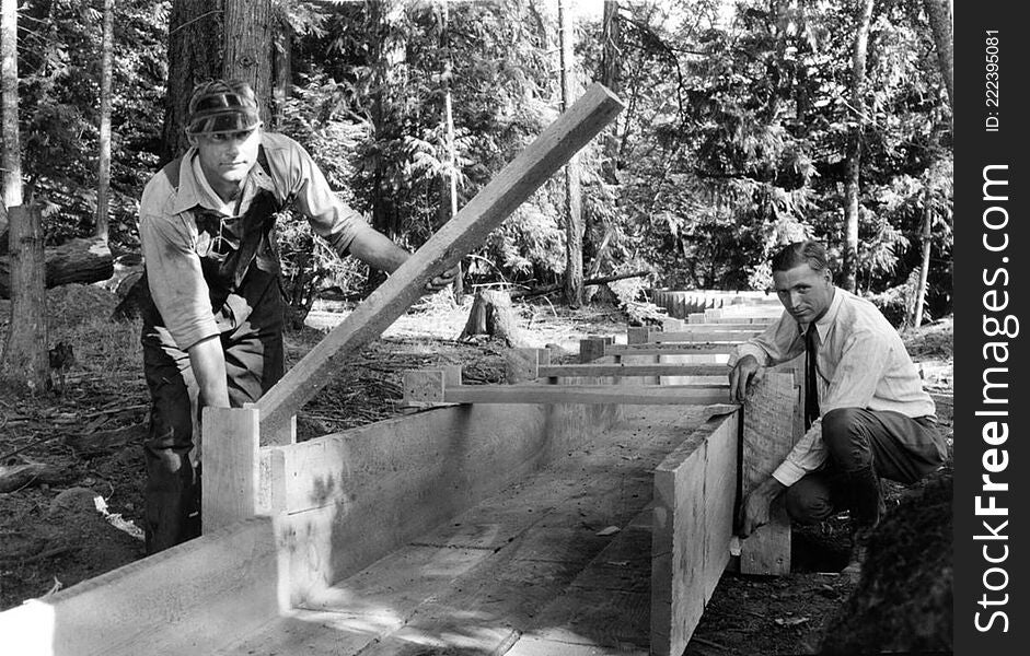 Arthur King, Soil Specialist At Oregon State College, Demonstrates How To Build A Flume, Circa 1930