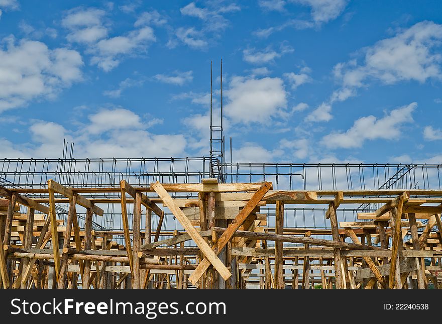 House construction in development with blue sky background