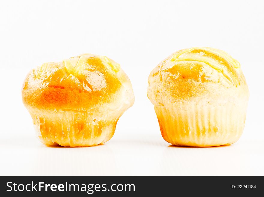 Sweet bread on white background