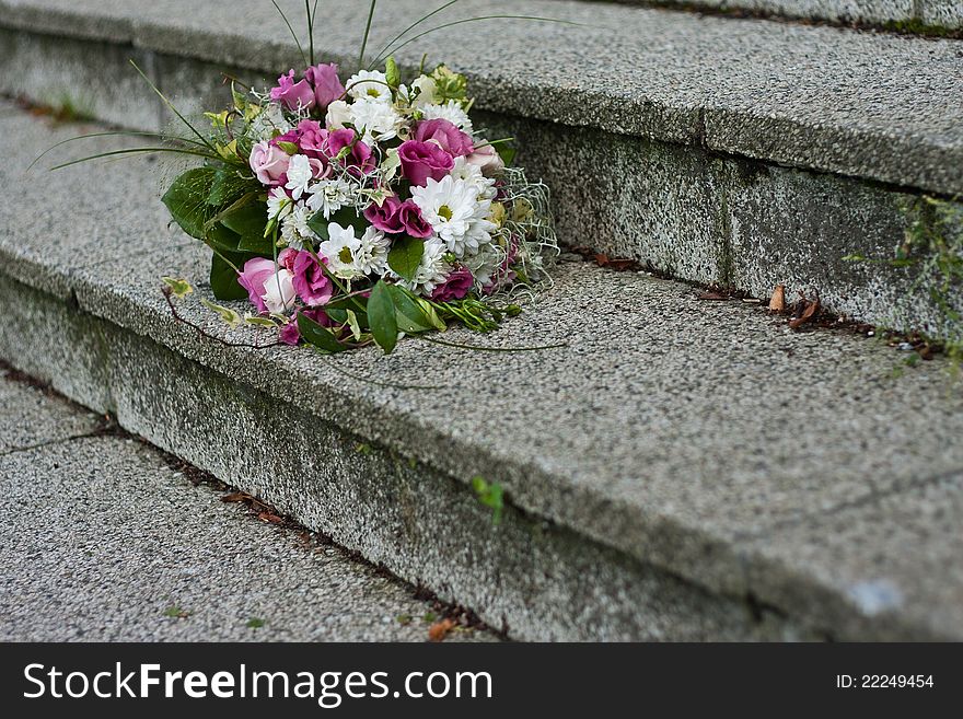 Bridal bouquet on the stone.