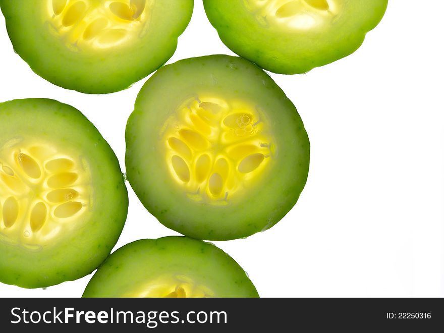 Closeup of many sliced cucumbers
