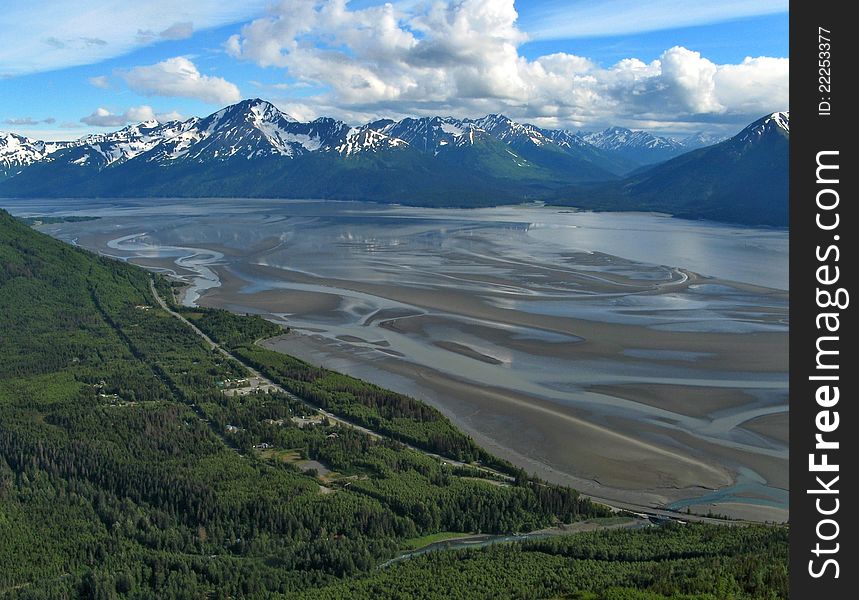 Low tide and mudflats at sea bay in Alaska near Anchorage. Low tide and mudflats at sea bay in Alaska near Anchorage