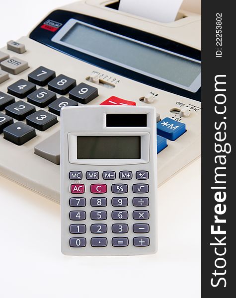 Roll paper calculator on desk. Roll paper calculator on desk