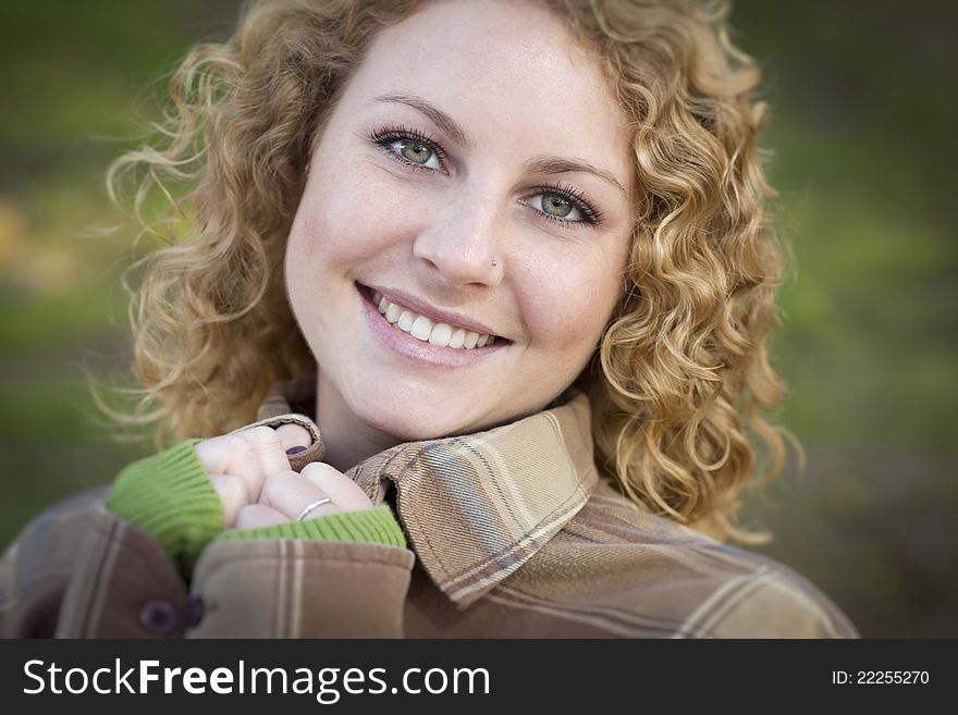 Pretty Young Blonde Smiling Woman Outdoor Portrait. Pretty Young Blonde Smiling Woman Outdoor Portrait.