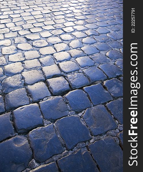 Cobblestone street at dusk, background. Cobblestone street at dusk, background.