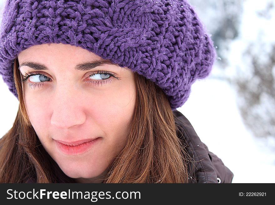 Girl with a purple hat, winter fashion