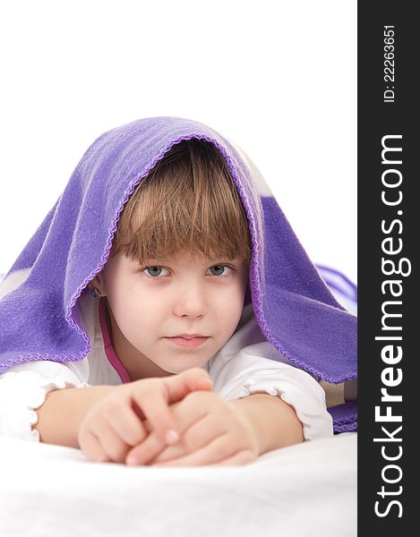 Child Under Purple Blankets